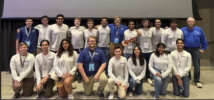 Large group of students with first row kneeling in front of second row