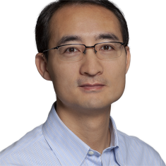 Headshot of Asian male wearing eyeglasses.